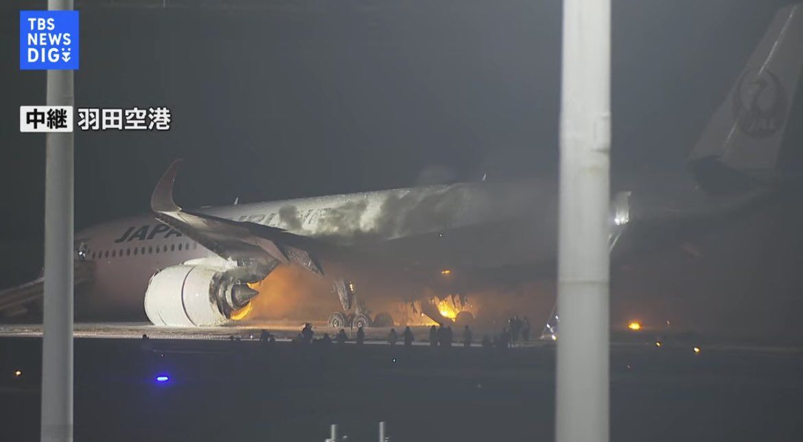 An Airbus A350-900 (JA13XJ) Japan Airlines is on fire at Tokyo’s Haneda Airport after arriving from Sapporo as #JL516.